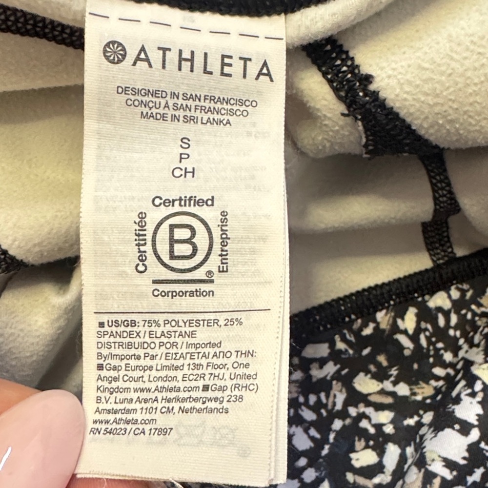Athleta Rainier Tight Fleece Lined Leggings Zip Pockets Black Print Size S - Picture 9 of 10